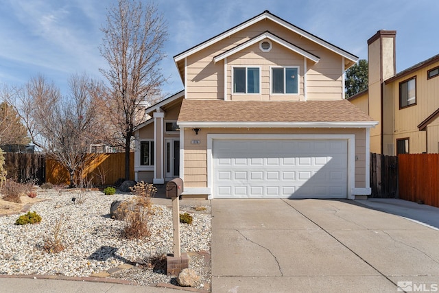 traditional-style house with a garage, fence, concrete driveway, and roof with shingles