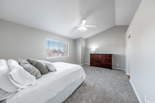 bedroom featuring lofted ceiling, ceiling fan, baseboards, and carpet flooring