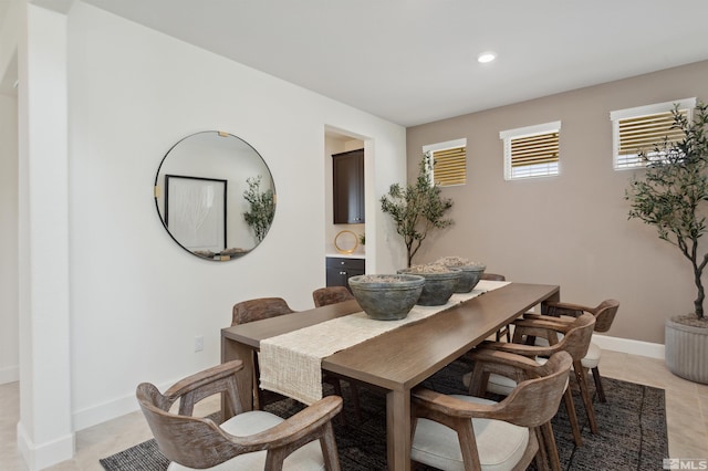 dining area with recessed lighting, baseboards, and light tile patterned floors