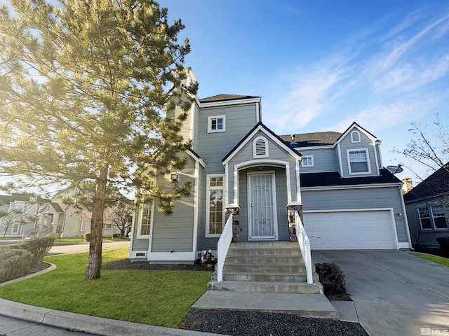 traditional-style home with a garage, a front yard, and concrete driveway