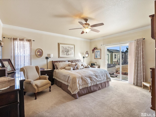 carpeted bedroom featuring a textured ceiling, access to outside, ornamental molding, and multiple windows