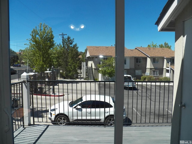 balcony featuring a residential view