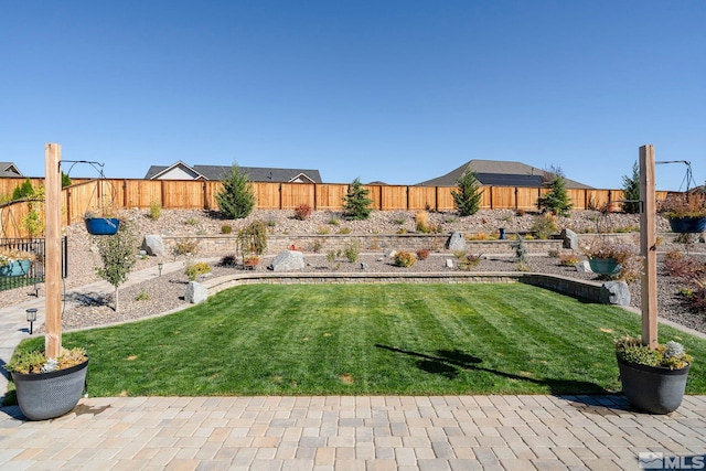 view of yard featuring a fenced backyard