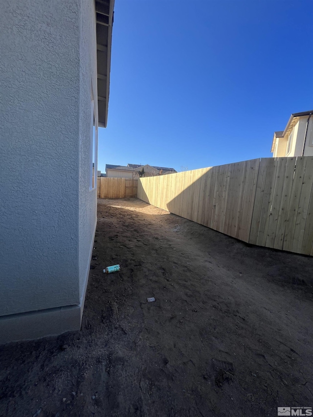 view of yard featuring fence private yard