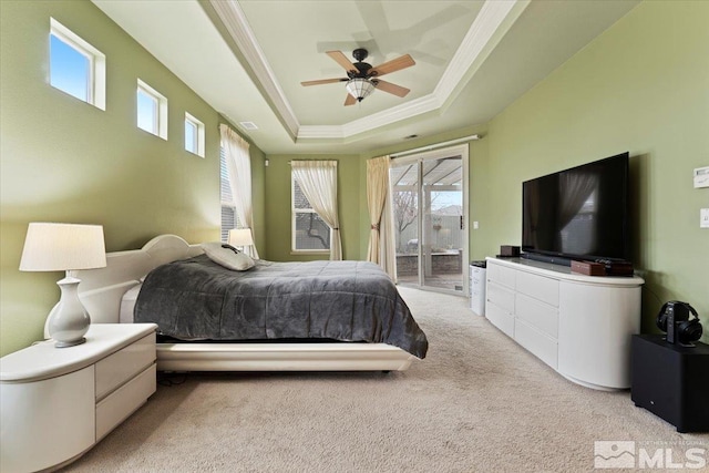 bedroom featuring a raised ceiling, light colored carpet, ceiling fan, access to outside, and crown molding