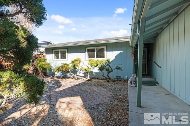 exterior space with a patio and crawl space