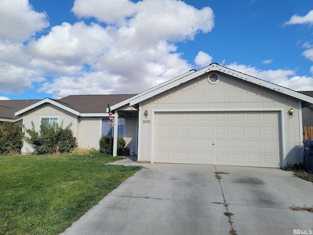 ranch-style house with concrete driveway, a front lawn, and an attached garage