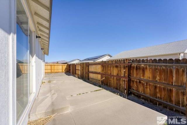 view of patio featuring a fenced backyard