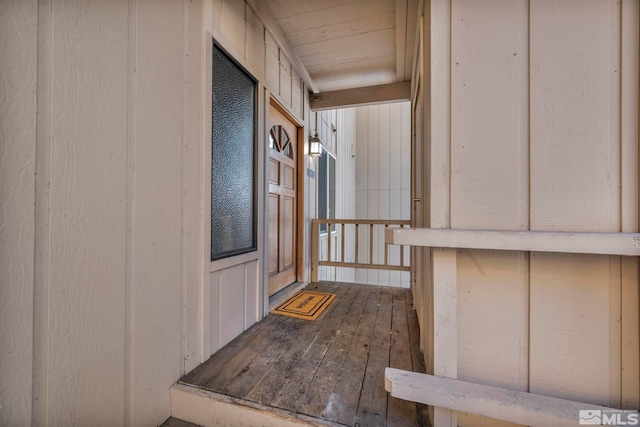 entrance to property featuring board and batten siding