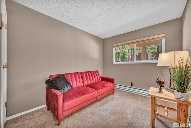 living room with carpet, baseboards, a textured ceiling, and baseboard heating