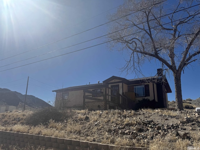 view of front of house with a mountain view