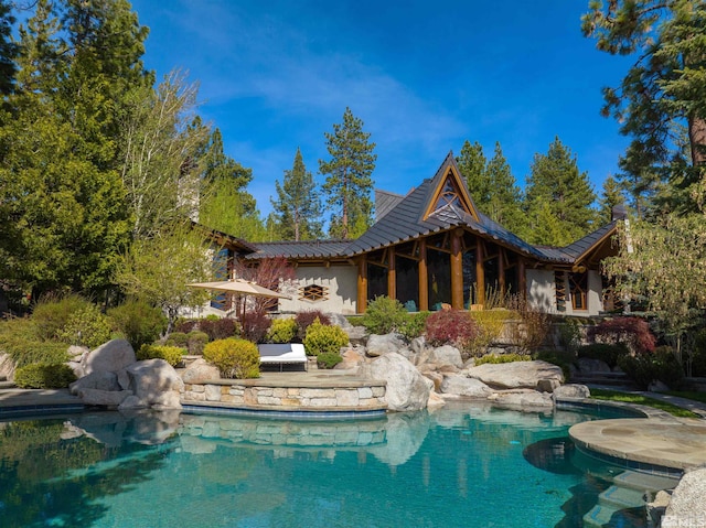 outdoor pool featuring a patio area