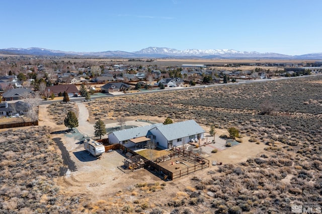 bird's eye view with a residential view and a mountain view