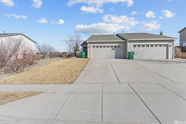 view of front of property with concrete driveway