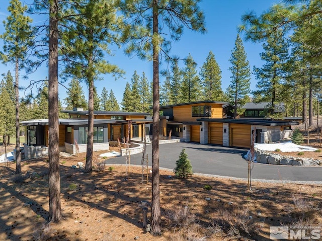 contemporary house with a garage and driveway