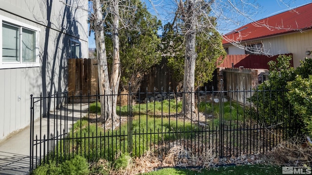 view of gate featuring fence