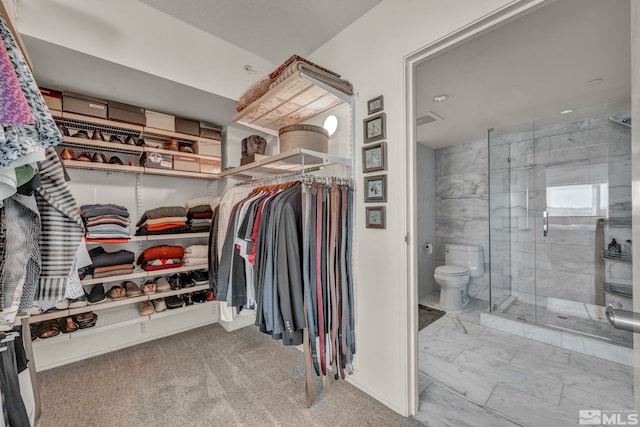 spacious closet featuring marble finish floor and visible vents