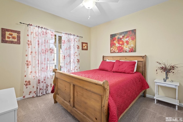 bedroom with light colored carpet, ceiling fan, and baseboards