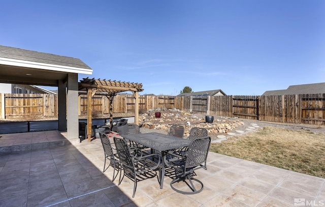 view of patio / terrace with outdoor dining space, a fenced backyard, and a pergola