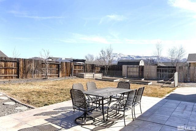 view of patio / terrace with a fenced backyard and outdoor dining space