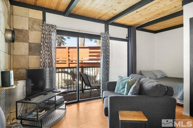 living room featuring wooden ceiling, beam ceiling, and wood finished floors