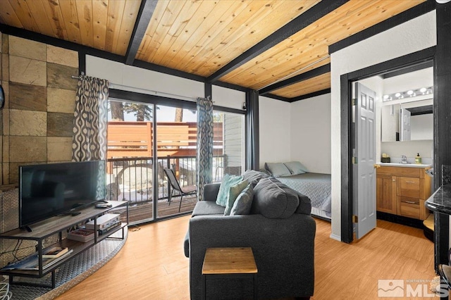 living room featuring light wood-style flooring, wooden ceiling, and beam ceiling