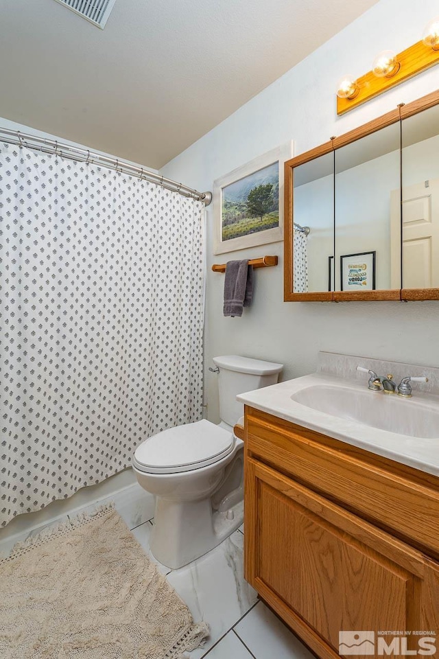 full bath with marble finish floor, visible vents, a shower with shower curtain, toilet, and vanity