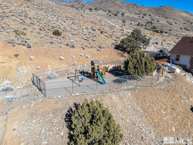 drone / aerial view featuring a mountain view