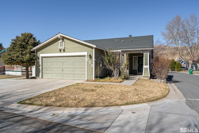 ranch-style house with an attached garage and concrete driveway