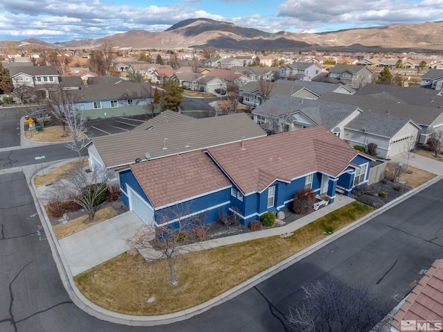 bird's eye view featuring a mountain view and a residential view