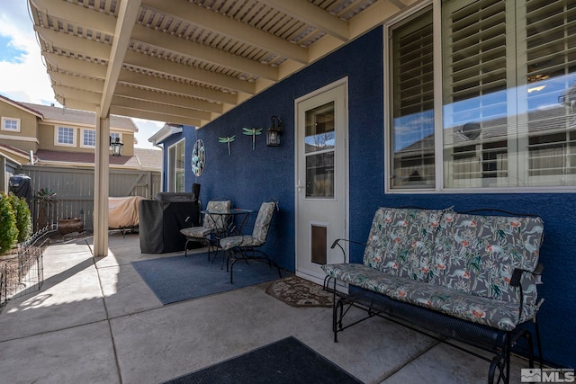 view of patio / terrace with fence