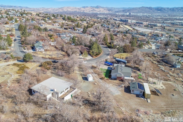 birds eye view of property with a residential view and a mountain view