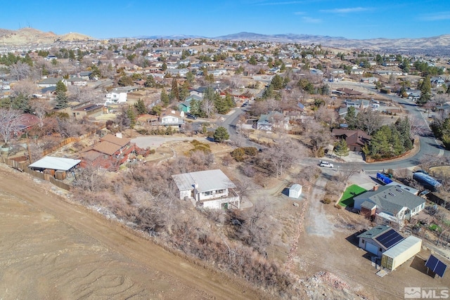 bird's eye view with a residential view and a mountain view