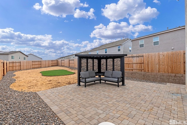 view of patio / terrace featuring a fenced backyard and an outdoor living space