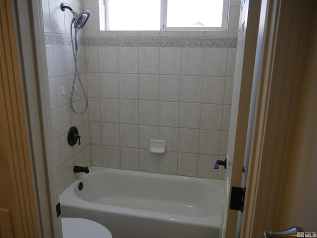 full bath featuring tub / shower combination and toilet