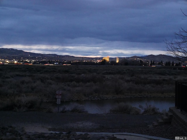 mountain view featuring a water view