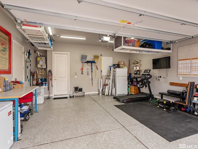 garage with baseboards and a garage door opener