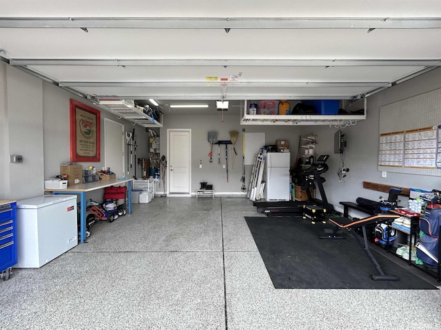 garage featuring refrigerator