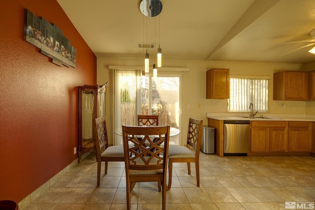 dining area with a ceiling fan, light tile patterned floors, visible vents, and a wealth of natural light