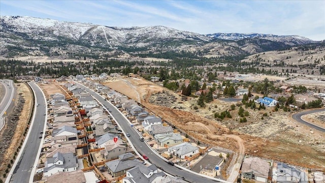 birds eye view of property featuring a residential view and a mountain view