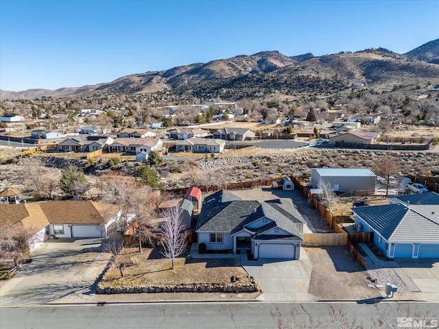 bird's eye view with a residential view and a mountain view