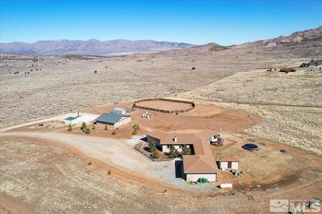 drone / aerial view featuring a mountain view