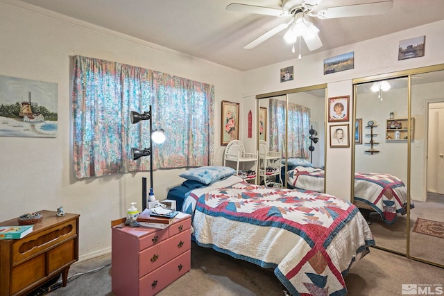 bedroom with carpet and a ceiling fan
