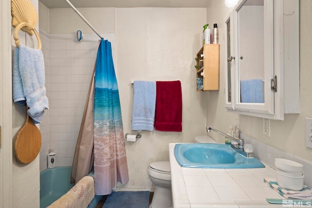 full bath with vanity, shower / bath combination with curtain, and toilet