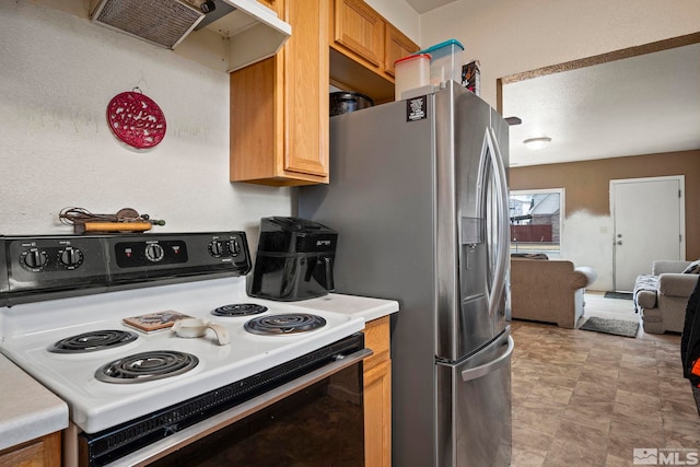 kitchen with open floor plan, electric stove, light countertops, and under cabinet range hood