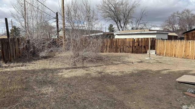 view of yard with fence