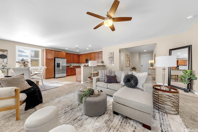 living room featuring ceiling fan and recessed lighting