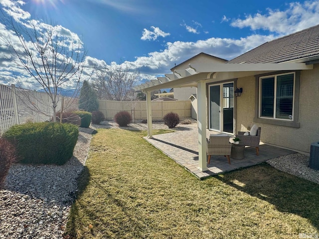 view of yard featuring a patio area and a fenced backyard