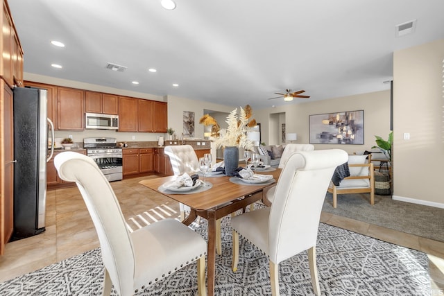 dining area featuring light tile patterned floors, visible vents, a ceiling fan, and recessed lighting