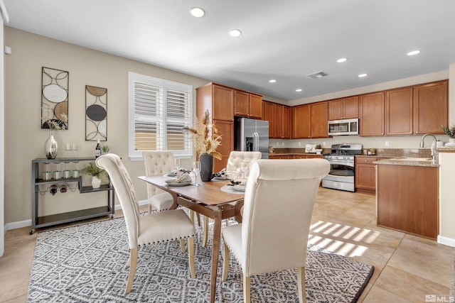 dining room with recessed lighting, visible vents, baseboards, and light tile patterned flooring